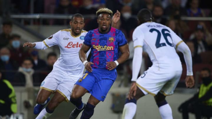 Adama Traore vies for the ball with Kalidou Koulibaly (R) during the UEFA Europa League Knockout Round Play-Off match between FC Barcelona and SSC Napoli at Camp Nou on February 17, 2022 in Barcelona, Spain. (Photo by Pablo Morano/MB Media/Getty Images)