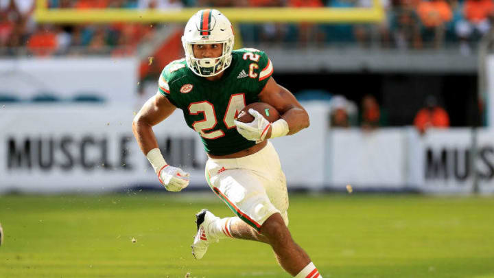 MIAMI GARDENS, FL - OCTOBER 14: Travis Homer #24 of the Miami Hurricanes rushes during a game against the Georgia Tech Yellow Jackets at Sun Life Stadium on October 14, 2017 in Miami Gardens, Florida. (Photo by Mike Ehrmann/Getty Images)