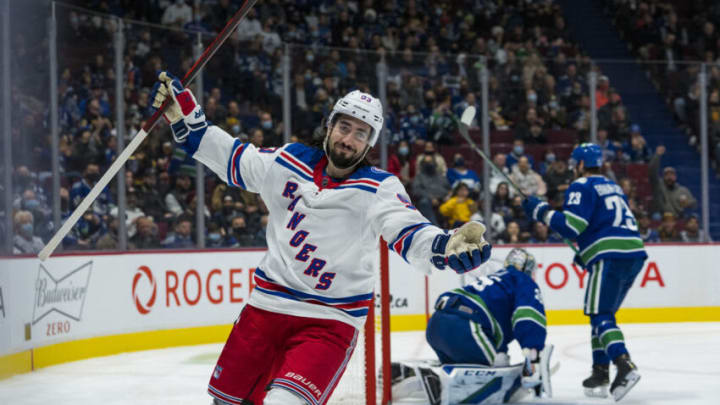 Nov 2, 2021; Vancouver, British Columbia, CAN; New York Rangers forward Mika Zibanejad (93) celebrates his goal scored on Vancouver Canucks goalie Thatcher Demko (35) in the second period at Rogers Arena. Mandatory Credit: Bob Frid-USA TODAY Sports