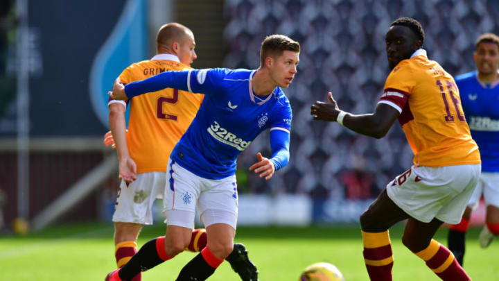 MOTHERWELL, SCOTLAND - SEPTEMBER 27: Cedric Itten of Rangers challenges Liam Grimshaw of Motherwell for the ball during the Ladbrokes Scottish Premiership match between Motherwell and Rangers at Fir Park on September 27, 2020 in Motherwell, Scotland. (Photo by Mark Runnacles/Getty Images)