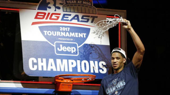 Mar 11, 2017; New York, NY, USA; Villanova Wildcats guard Josh Hart (3) reacts while cutting down the net after defeating the Creighton Bluejays in the Big East Conference Tournament final game at Madison Square Garden. Mandatory Credit: Adam Hunger-USA TODAY Sports