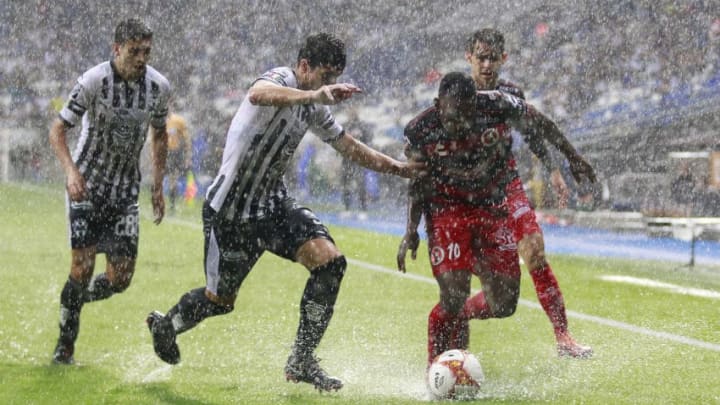 MONTERREY, MEXICO - SEPTEMBER 29: Eric Cantu (L) of Monterrey fights for the ball with Fabian Castillo (R) of Tijuana during the 11th round match between Monterrey and Tijuana as part of the Torneo Apertura 2018 Liga MX at BBVA Bancomer Stadium on September 29, 2018 in Monterrey, Mexico. (Photo by Alfredo Lopez/Jam Media/Getty Images)