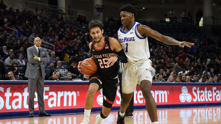 Davide Moretti #25 of the Texas Tech Red Raiders Romeo Weems #1 of the DePaul Blue Demons. (Photo by Quinn Harris/Getty Images)