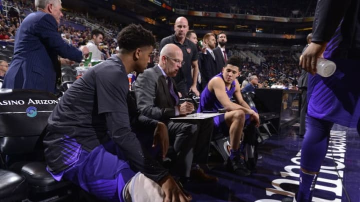 PHOENIX, AZ - JANUARY 26: Coach Jay Triano of the Phoenix Suns discusses a game plan with his team during the game against the New York Knicks on January 26, 2018 at Talking Stick Resort Arena in Phoenix, Arizona. NOTE TO USER: User expressly acknowledges and agrees that, by downloading and or using this photograph, user is consenting to the terms and conditions of the Getty Images License Agreement. Mandatory Copyright Notice: Copyright 2018 NBAE (Photo by Barry Gossage/NBAE via Getty Images)