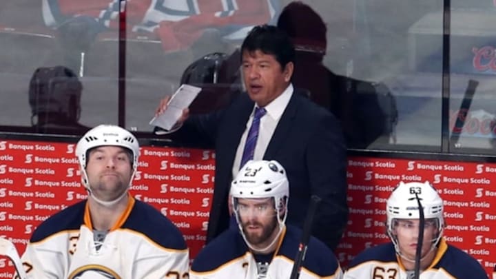 Mar 25, 2014; Montreal, Quebec, CAN; Buffalo Sabres interim head coach Ted Nolan reacts during the third period against Montreal Canadiens and left wings John Scott (32) and Ville Leino (23) and Tyler Ennis (63) at Bell Centre. Mandatory Credit: Jean-Yves Ahern-USA TODAY Sports