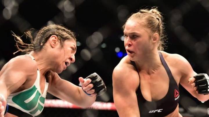 Aug 1, 2015; Rio de Janeiro, RJ, Brazil; Ronda Rousey (red gloves) fights Bethe Correia (blue gloves) during UFC 190 at HSBC Arena. Mandatory Credit: Jason Silva-USA TODAY Sports