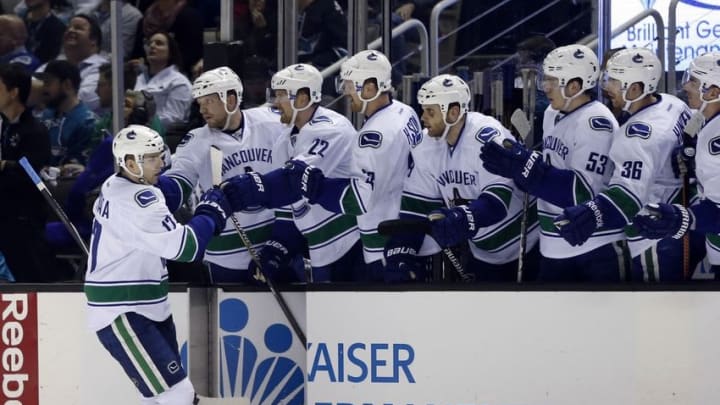 Mar 7, 2015; San Jose, CA, USA; Vancouver Canucks right wing Radim Vrbata (17) celebrates with the Vancouver Canucks bench after scoring a goal during the first period against the San Jose Sharks at SAP Center at San Jose. Mandatory Credit: Bob Stanton-USA TODAY Sports