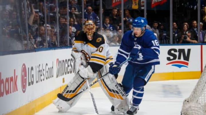 TORONTO, ON – APRIL 21: Tuukka Rask #40 of the Boston Bruins plays the puck against Mitch Marner #16 of the Toronto Maple Leafs during the third period during Game Six of the Eastern Conference First Round during the 2019 NHL Stanley Cup Playoffs at the Scotiabank Arena on April 21, 2019 in Toronto, Ontario, Canada. (Photo by Mark Blinch/NHLI via Getty Images)