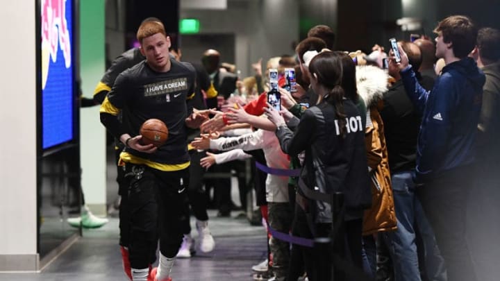 MILWAUKEE, WISCONSIN - JANUARY 21: Donte DiVincenzo #9 of the Milwaukee Bucks leads his team onto the court prior to a game against the Dallas Mavericks at Fiserv Forum on January 21, 2019 in Milwaukee, Wisconsin. NOTE TO USER: User expressly acknowledges and agrees that, by downloading and or using this photograph, User is consenting to the terms and conditions of the Getty Images License Agreement. (Photo by Stacy Revere/Getty Images)