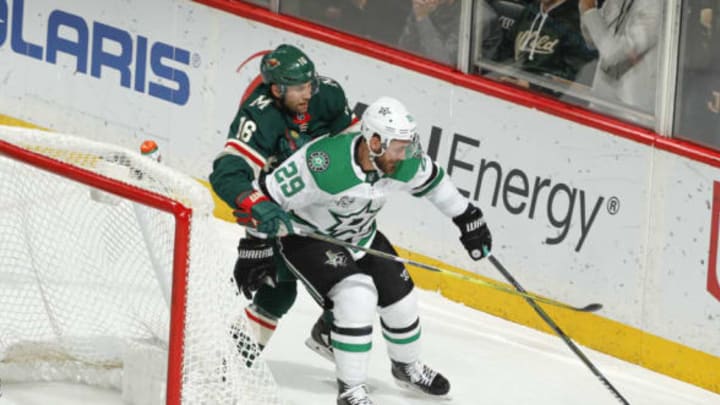 ST. PAUL, MN - DECEMBER 27: Greg Pateryn #29 of the Dallas Stars skates with the puck while Jason Zucker #16 of the Minnesota Wild defends during the game at the Xcel Energy Center on December 27, 2017 in St. Paul, Minnesota. (Photo by Bruce Kluckhohn/NHLI via Getty Images)