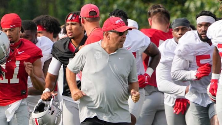 Aug 4, 2022; Columbus, OH, USA; Ohio State Buckeyes offensive coordinator Kevin Wilson runs between drills during the first fall football practice at the Woody Hayes Athletic Center. Mandatory Credit: Adam Cairns-The Columbus DispatchOhio State Football First Practice Aug 4, 2022; Columbus, OH, USA; Ohio State Buckeyes offensive coordinator Kevin Wilson runs between drills during the first fall football practice at the Woody Hayes Athletic Center. Mandatory Credit: Adam Cairns-The Columbus DispatchOhio State Football First Practice
