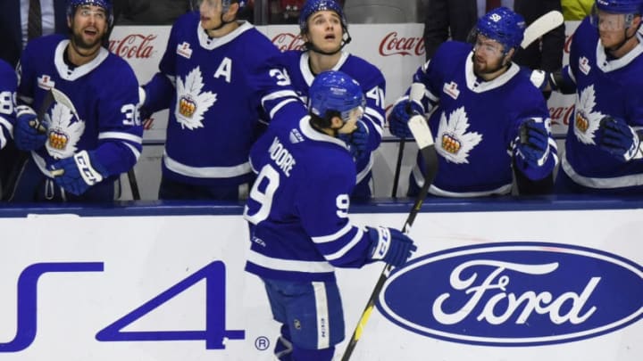 TORONTO, ON - JANUARY 9: Trevor Moore #9 of the Toronto Marlies celebrates his goal with teammates against the Utica Comets during AHL game action on January 9, 2019 at Coca Cola Coliseum in Toronto, Ontario, Canada. (Photo by Graig Abel/Getty Images)