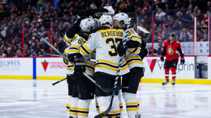 OTTAWA, ON - DECEMBER 30: Boston Bruins Center Patrice Bergeron (37) celebrates his power-play goal with teammates during third period National Hockey League action between the Boston Bruins and Ottawa Senators on December 30, 2017, at Canadian Tire Centre in Ottawa, ON, Canada. (Photo by Richard A. Whittaker/Icon Sportswire via Getty Images)