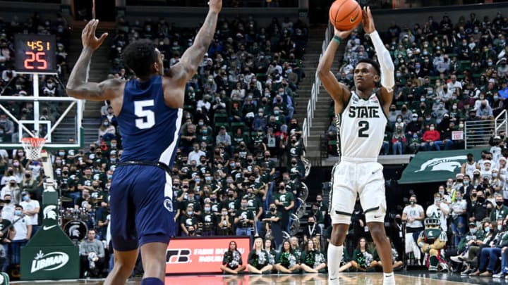 Dec 11, 2021; East Lansing, Michigan, USA; Michigan State Spartans guard Tyson Walker (2) shoots in the open past Penn State Nittany Lions forward Greg Lee (5) in the second half at Jack Breslin Student Events Center. Mandatory Credit: Dale Young-USA TODAY Sports
