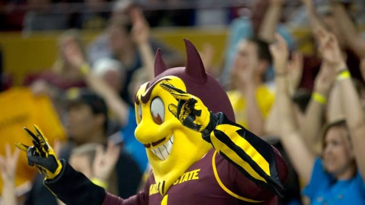 Dec 13, 2014; Tempe, AZ, USA; Arizona State Sun Devils mascot Sparky reacts during the second half against the Pepperdine Waves at Wells-Fargo Arena. Sun Devils defeated the Waves 81-74 Mandatory Credit: Allan Henry-USA TODAY Sports