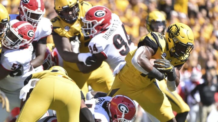 COLUMBIA, MO - SEPTEMBER 22: Running back Damarea Crockett #16 of the Missouri Tigers gets past linebacker Juwan Taylor #44 of the Georgia Bulldogs as he runs for a touchdown in the third quarter quarter at Memorial Stadium on September 22, 2018 in Columbia, Missouri. (Photo by Ed Zurga/Getty Images)