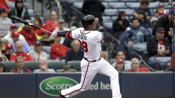 ATLANTA GA – OCTOBER 4: Hector Olivera #28 of the Atlanta Braves swings at a pitch during the sixth inning of the second baseball game in a double header against the St. Louis Cardinals at Turner Field on October 4, 2015, in Atlanta, Georgia. (Photo by Butch Dill/Getty Images)