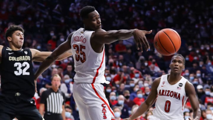 TUCSON, ARIZONA - JANUARY 13: Center Christian Koloko #35 of the Arizona Wildcats can't get a hand on a loose ball during the NCAAB game at McKale Center on January 03, 2022 in Tucson, Arizona. The Arizona Wildcats won 76-55 against the Colorado Buffaloes. (Photo by Rebecca Noble/Getty Images)
