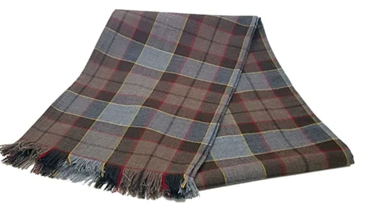 Discover Celtic Croft's Fraser tartan scarf available on Amazon.