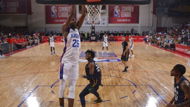 LAS VEGAS, NV - JULY 8: Mitchell Robinson #26 of the New York Knicks dunks the ball against the Utah Jazz during the 2018 Las Vegas Summer League on July 8, 2018 at the Cox Pavilion in Las Vegas, Nevada. NOTE TO USER: User expressly acknowledges and agrees that, by downloading and/or using this Photograph, user is consenting to the terms and conditions of the Getty Images License Agreement. Mandatory Copyright Notice: Copyright 2018 NBAE (Photo by Bart Young/NBAE via Getty Images)