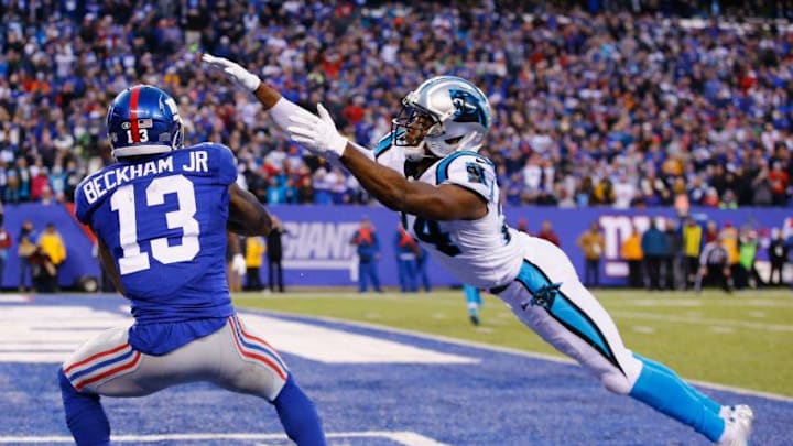 EAST RUTHERFORD, NJ - DECEMBER 20: Odell Beckham #13 of the New York Giants scores a game tying touchdown against Josh Norman #24 of the Carolina Panthers in the fourth Quarter during their game at MetLife Stadium on December 20, 2015 in East Rutherford, New Jersey. (Photo by Al Bello/Getty Images)