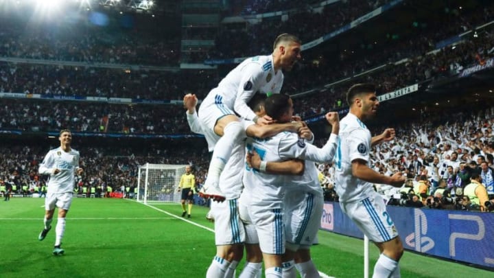 Real Madrid's players celebrate their second goal during the UEFA Champions League semi-final second leg football match between Real Madrid and Bayern Munich at the Santiago Bernabeu Stadium in Madrid on May 1, 2018. (Photo by OSCAR DEL POZO / AFP) (Photo credit should read OSCAR DEL POZO/AFP/Getty Images)