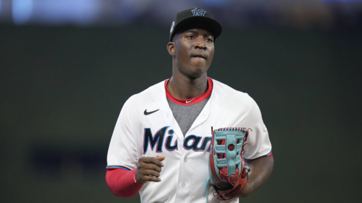 MIAMI, FLORIDA - MAY 15: Jesus Sanchez #7 of the Miami Marlins runs back to the dugout against the Milwaukee Brewers at loanDepot park on May 15, 2022 in Miami, Florida. (Photo by Mark Brown/Getty Images)