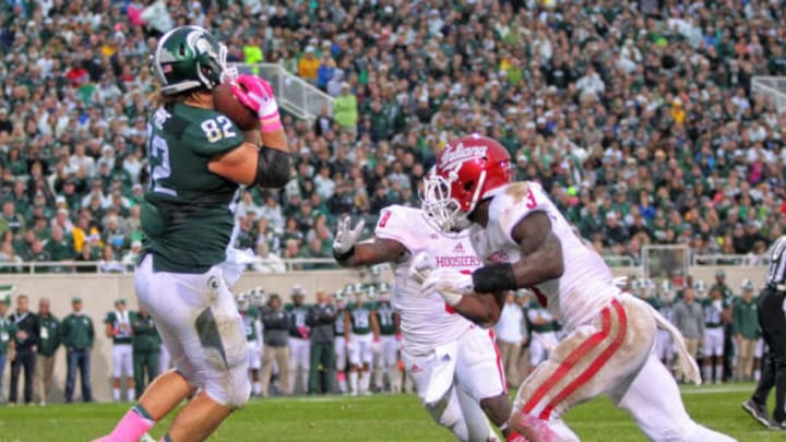 Oct 24, 2015; East Lansing, MI, USA; Michigan State Spartans tight end Josiah Price (82) makes a catch for a touchdown against the Indiana Hoosiers during the 2nd half of a game at Spartan Stadium. Mandatory Credit: Mike Carter-USA TODAY Sports