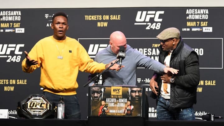 HOUSTON, TX - FEBRUARY 07: (L-R) Israel Adesanya and Yoel Romero stand up during the UFC 248 Press Conference at the Toyota Center on February 7, 2020 in Houston, Texas. (Photo by Josh Hedges/Zuffa LLC via Getty Images)