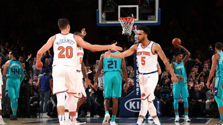 BROOKLYN, NY - NOVEMBER 7: Courtney Lee #5 high gives Doug McDermott #20 of the New York Knicks during the game against the Charlotte Hornets on November 7, 2017 at Madison Square Garden in New York City, New York. Copyright 2017 NBAE (Photo by Nathaniel S. Butler/NBAE via Getty Images)