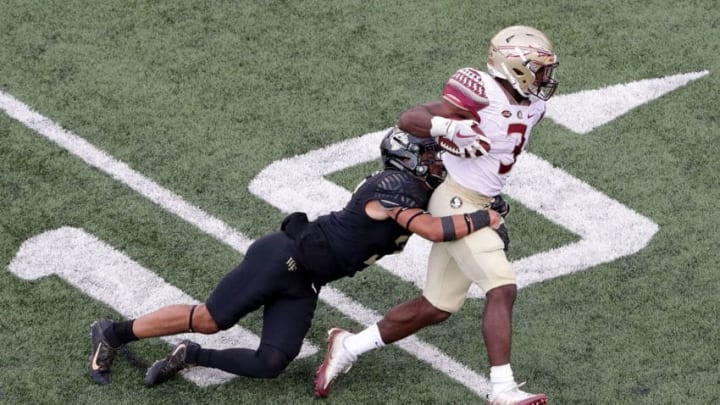 WINSTON SALEM, NC - SEPTEMBER 30: Jessie Bates III #3 of the Wake Forest Demon Deacons tackles Cam Akers #3 of the Florida State Seminoles during their game at BB&T Field on September 30, 2017 in Winston Salem, North Carolina. (Photo by Streeter Lecka/Getty Images)
