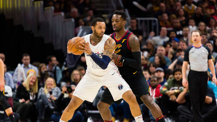 CLEVELAND, OH - FEBRUARY 22: Mike Scott #30 of the Washington Wizards posts up against Jeff Green #32 of the Cleveland Cavaliers during the second half at Quicken Loans Arena on February 22, 2018 in Cleveland, Ohio. The Wizards defeated the Cavaliers 110-103. NOTE TO USER: User expressly acknowledges and agrees that, by downloading and or using this photograph, User is consenting to the terms and conditions of the Getty Images License Agreement. (Photo by Jason Miller/Getty Images)