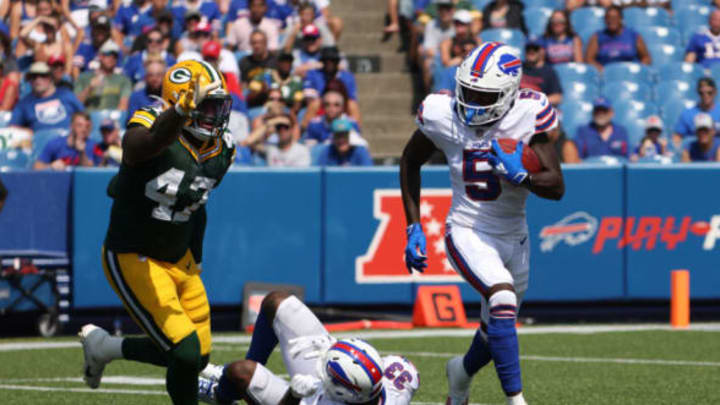 ORCHARD PARK, NY – AUGUST 28: Marquez Stevenson #5 of the Buffalo Bills runs the ball after a catch as Chauncey Rivers #47 of the Green Bay Packers looks to make a tackle during the second half at Highmark Stadium on August 28, 2021 in Orchard Park, New York. (Photo by Timothy T Ludwig/Getty Images)