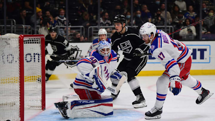Jan 10, 2022; Los Angeles, California, USA; New York Rangers goaltender Alexandar Georgiev (40) blocks a shot against Los Angeles Kings center Rasmus Kupari (89) during the second period at Crypto.com Arena. Mandatory Credit: Gary A. Vasquez-USA TODAY Sports
