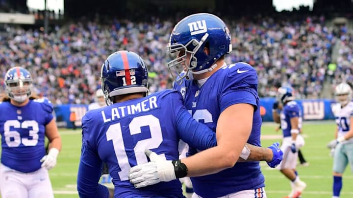 EAST RUTHERFORD, NEW JERSEY - DECEMBER 30: Cody Latimer #12 of the New York Giants is congratulated by his teammate Nate Solder #76 after his second quarter touchdown reception against the Dallas Cowboys at MetLife Stadium on December 30, 2018 in East Rutherford, New Jersey. (Photo by Steven Ryan/Getty Images)