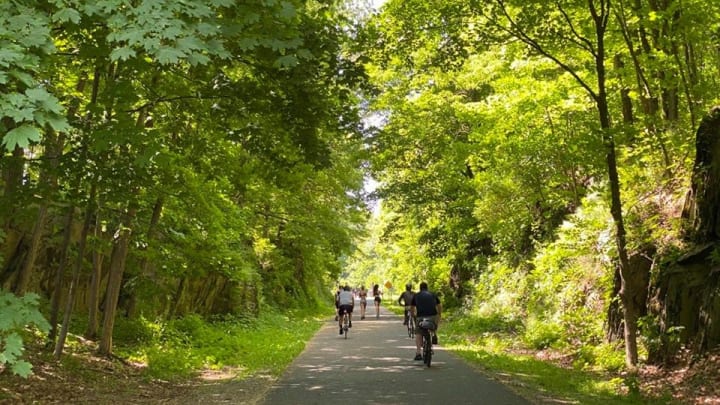 Bikers and runners enjoy the Hudson Valley Rail Trail in Highland on Sunday, June 7, 2020.Highland Weather