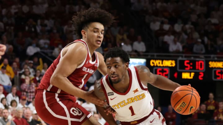 Feb 19, 2022; Ames, Iowa, USA; Oklahoma Sooners forward Jalen Hill (1) defends Iowa State Cyclones guard Tyrese Hunter (11) at James H. Hilton Coliseum. The Cyclones win 75 to 54. Mandatory Credit: Reese Strickland-USA TODAY Sports
