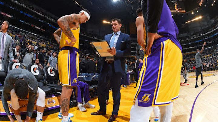LOS ANGELES, CA - MARCH 4: Head Coach Luke Walton of the Los Angeles Lakers draws a play during a huddle on March 4, 2019 at STAPLES Center in Los Angeles, California. NOTE TO USER: User expressly acknowledges and agrees that, by downloading and/or using this Photograph, user is consenting to the terms and conditions of the Getty Images License Agreement. Mandatory Copyright Notice: Copyright 2019 NBAE (Photo by Andrew D. Bernstein/NBAE via Getty Images)