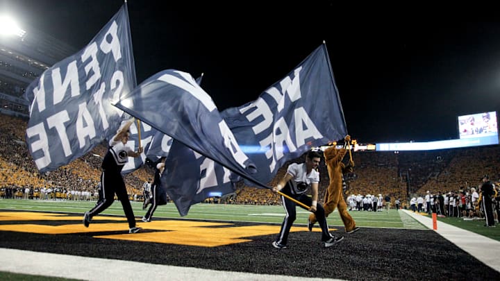 IOWA CITY, IOWA- SEPTEMBER 23: Penn State Nittany Lions cheerleaders celebrate after a touchdown in the third quarter against the Iowa Hawkeyes on September 23, 2017 at Kinnick Stadium in Iowa City, Iowa. (Photo by Matthew Holst/Getty Images) *** Local Caption ***