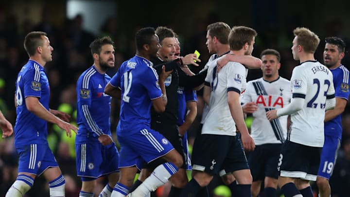 LONDON, ENGLAND - MAY 02 : Referee Mark Clattenburg gets caught up in the melee as Eden Hazard of Chelsea lies injured during the Barclays Premier League match between Chelsea and Tottenham Hotspur at Stamford Bridge on May 2, 2016 in London, England. (Photo by Catherine Ivill - AMA/Getty Images)
