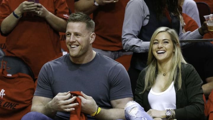 HOUSTON, TX - APRIL 16: J.J. Watt of the Houston Texans and girlfriend Kealia Ohai of the Houston Dash court side during Game One of the first round of the Western Conference 2017 NBA Playoffs at Toyota Center on April 16, 2017 in Houston, Texas. NOTE TO USER: User expressly acknowledges and agrees that, by downloading and/or using this photograph, user is consenting to the terms and conditions of the Getty Images License Agreement. (Photo by Bob Levey/Getty Images)