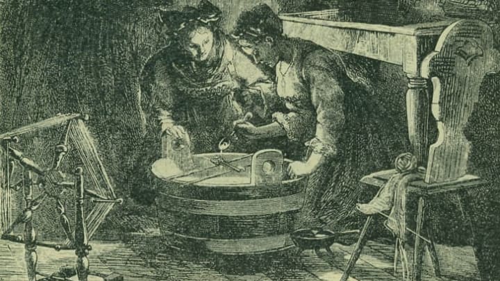 A drawing of women practicing divination with lead or wax