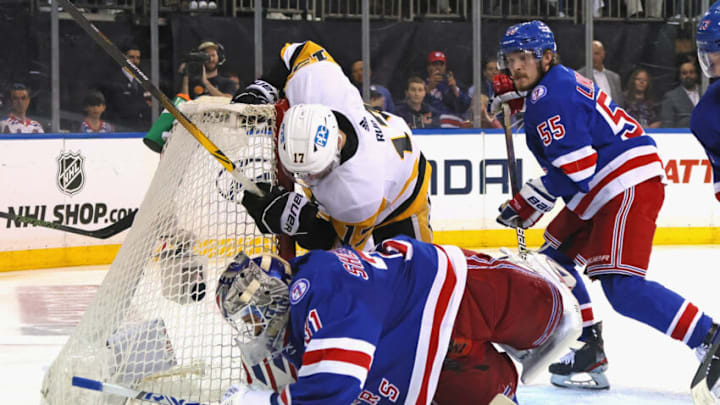 NEW YORK, NEW YORK - MAY 03: Bryan Rust #17 of the Pittsburgh Penguins runs into Igor Shesterkin #31 of the New York Rangers during the second overtime period in Game One of the First Round of the 2022 Stanley Cup Playoffs at Madison Square Garden on May 03, 2022 in New York City. (Photo by Bruce Bennett/Getty Images)