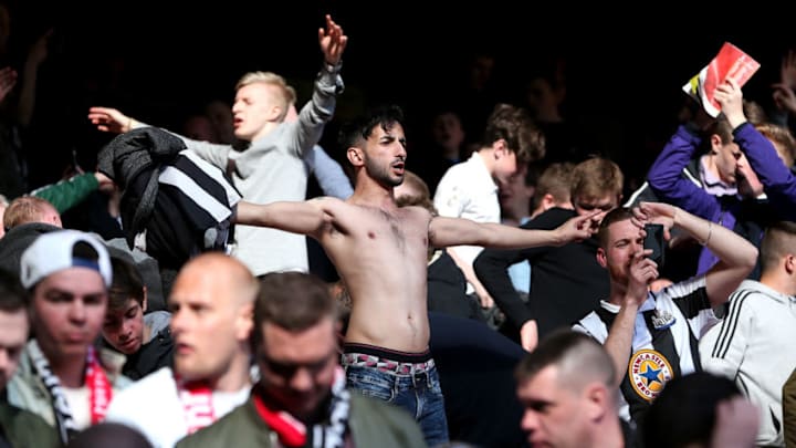 LIVERPOOL, ENGLAND - APRIL 23: Newcastle United fans cheer at the end final whistle during the Barclays Premier League match between Liverpool and Newcastle United at Anfield on April 23, 2016 in Liverpool, United Kingdom. (Photo by Jan Kruger/Getty Images)