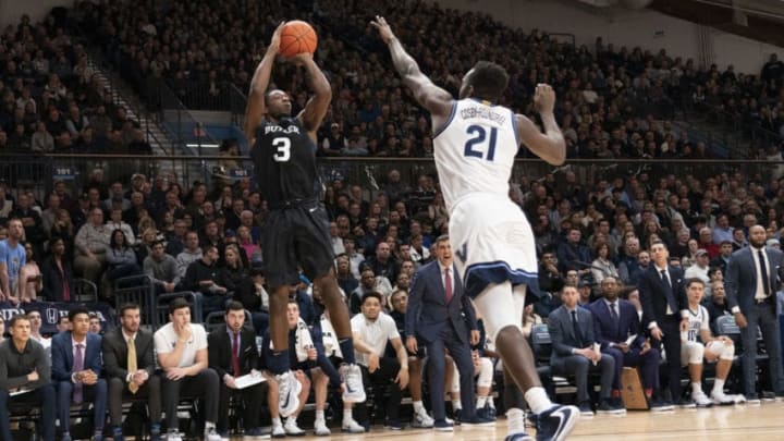 VILLANOVA, PA - JANUARY 21: Kamar Baldwin #3 of the Butler Bulldogs shoots the ball against Dhamir Cosby-Roundtree #21 of the Villanova Wildcats in the first half at Finneran Pavilion on January 21, 2020 in Villanova, Pennsylvania. (Photo by Mitchell Leff/Getty Images)