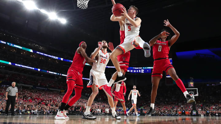 MINNEAPOLIS, MINNESOTA – APRIL 08: Kyle Guy #5 of the Virginia Cavaliers attempts a shot against the Texas Tech Red Raiders in the first half during the 2019 NCAA men’s Final Four National Championship game at U.S. Bank Stadium on April 08, 2019 in Minneapolis, Minnesota. (Photo by Tom Pennington/Getty Images)
