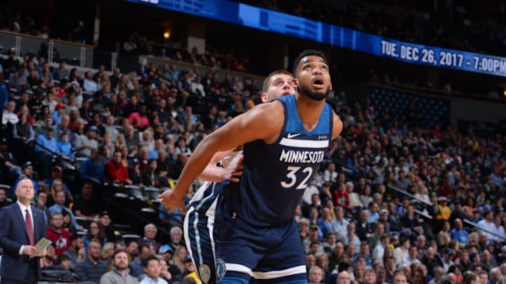 DENVER, CO - DECEMBER 20: Karl-Anthony Towns #32 of the Minnesota Timberwolves plays defense against the Denver Nuggets on December 20, 2017 at the Pepsi Center in Denver, Colorado. NOTE TO USER: User expressly acknowledges and agrees that, by downloading and/or using this Photograph, user is consenting to the terms and conditions of the Getty Images License Agreement. Mandatory Copyright Notice: Copyright 2017 NBAE (Photo by Bart Young/NBAE via Getty Images)