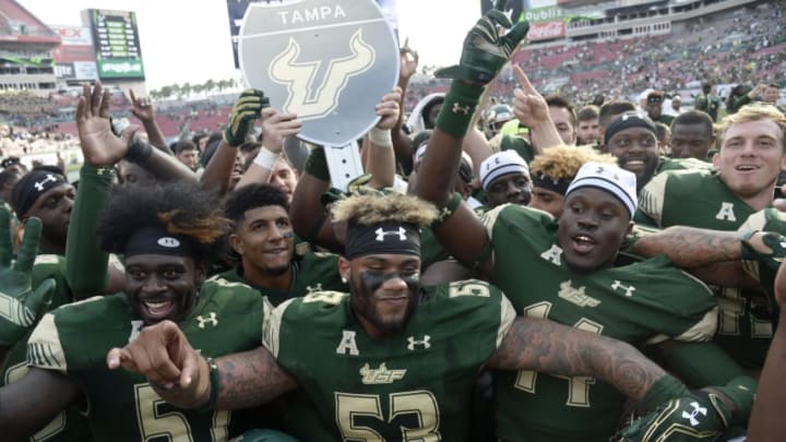 TAMPA, FL - NOVEMBER 26: The South Florida Bulls celebrate their win over the UCF Knights at Raymond James Stadium on November 26, 2016 in Tampa, Florida. (Photo by Jason Behnken / Getty Images)