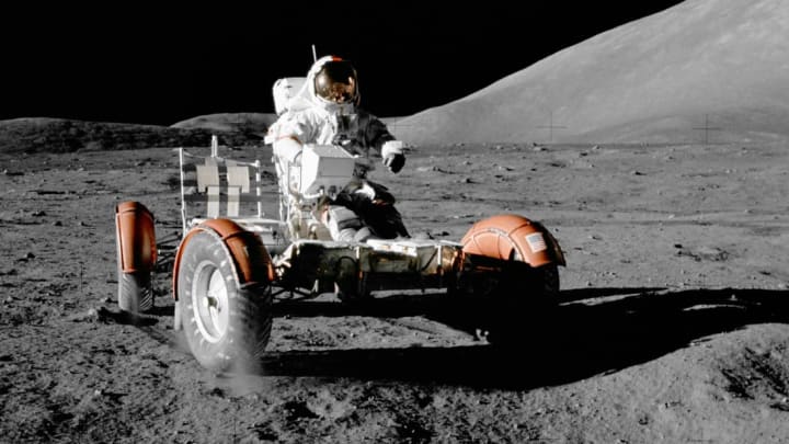 Astronaut Eugene A. Cernan mans a Lunar Roving Vehicle during the Apollo 17 mission.