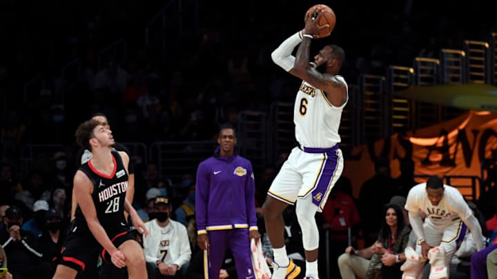 LOS ANGELES, CA - OCTOBER 31: LeBron James #6 of the Los Angeles Lakers shoots the ball against Alperen Sengun #28 of the Houston Rockets during the first half at Staples Center on October 31, 2021 in Los Angeles, California. NOTE TO USER: User expressly acknowledges and agrees that, by downloading and/or using this Photograph, user is consenting to the terms and conditions of the Getty Images License Agreement. (Photo by Kevork Djansezian/Getty Images)